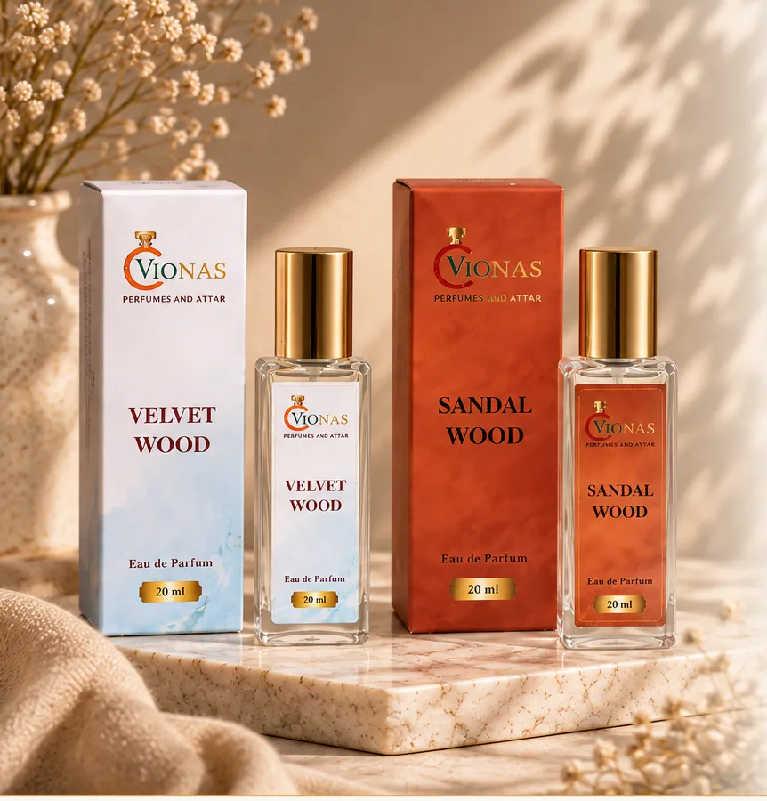 The Velvet Wood and Sandal Wood gift set - both 20 ml bottles with their boxes, arranged on marble.